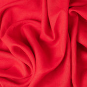 Bright Red linen fabric, crumpled to show its natural texture, washed European flax