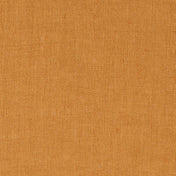 Caramel linen fabric, flat lay showing its natural weave, washed European flax