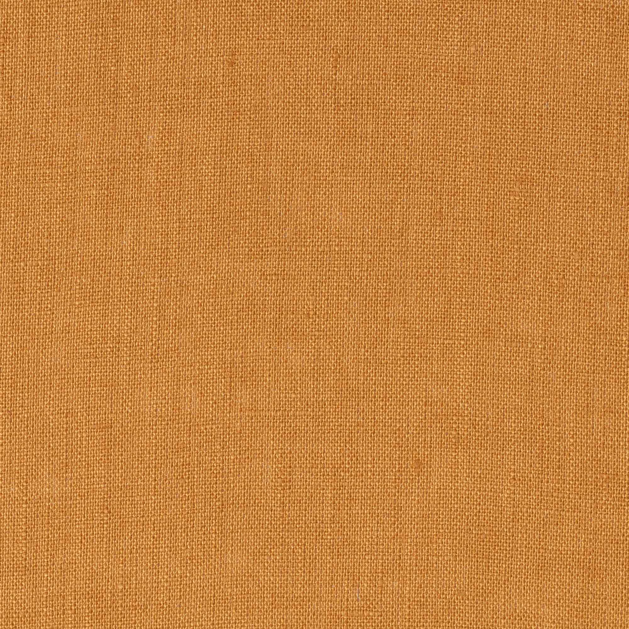 Caramel linen fabric, flat lay showing its natural weave, washed European flax