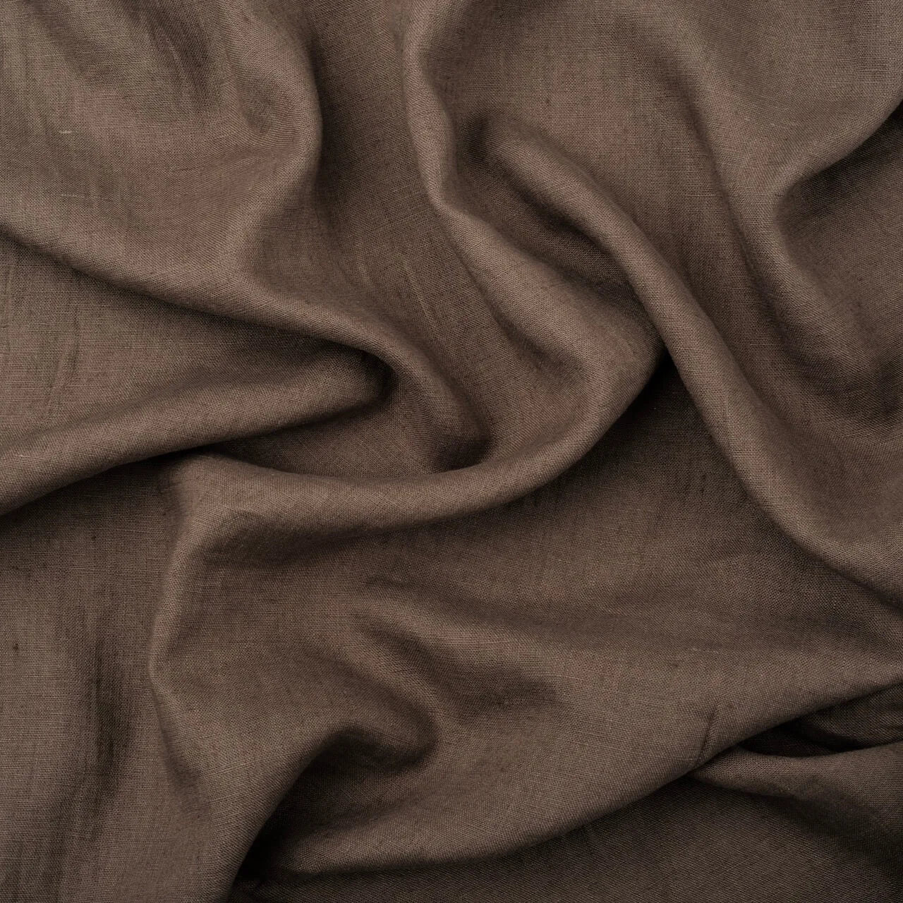 Cocoa Brown linen fabric, crumpled to show its natural texture, washed European flax