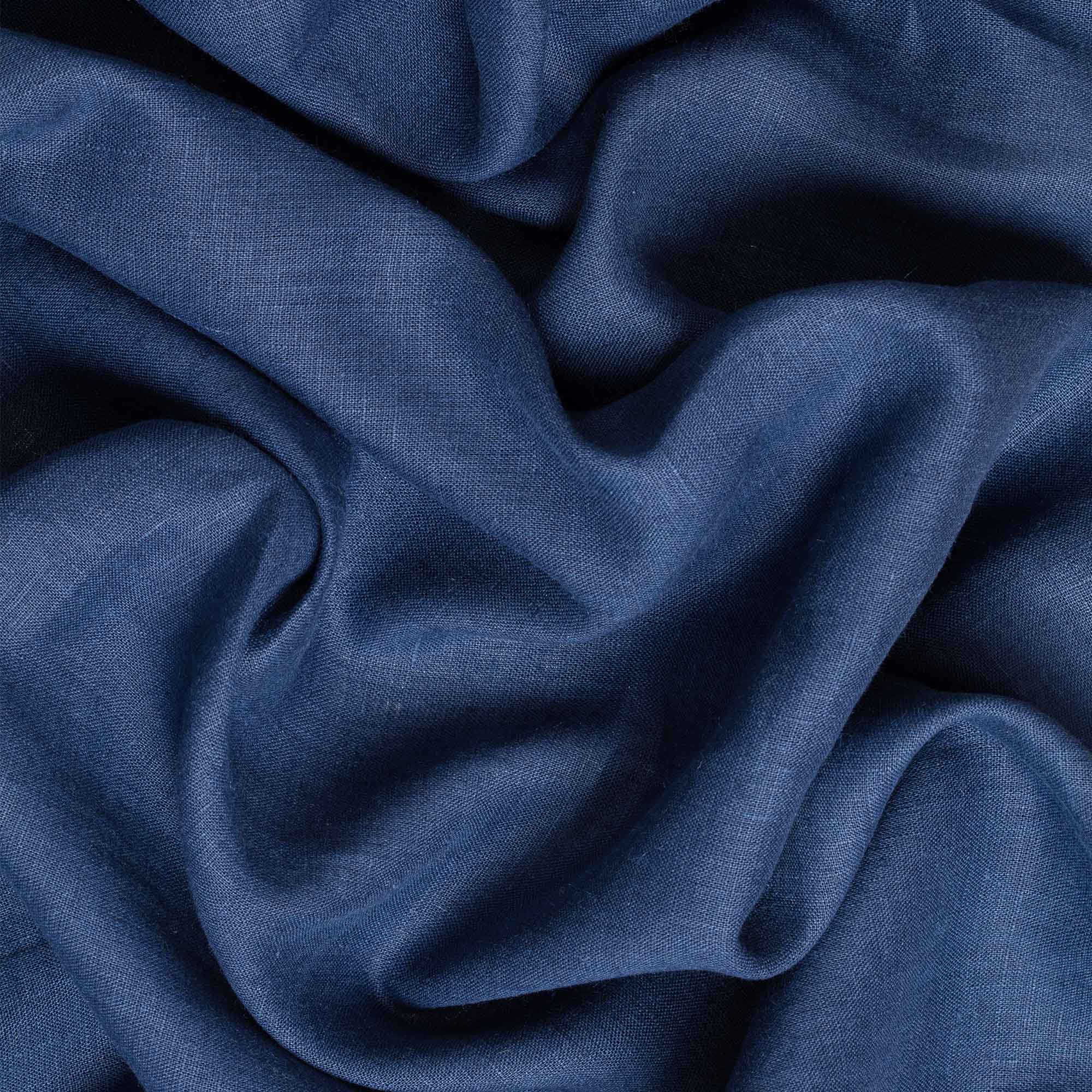 Dark Blue linen fabric, crumpled to show its natural texture, washed European flax