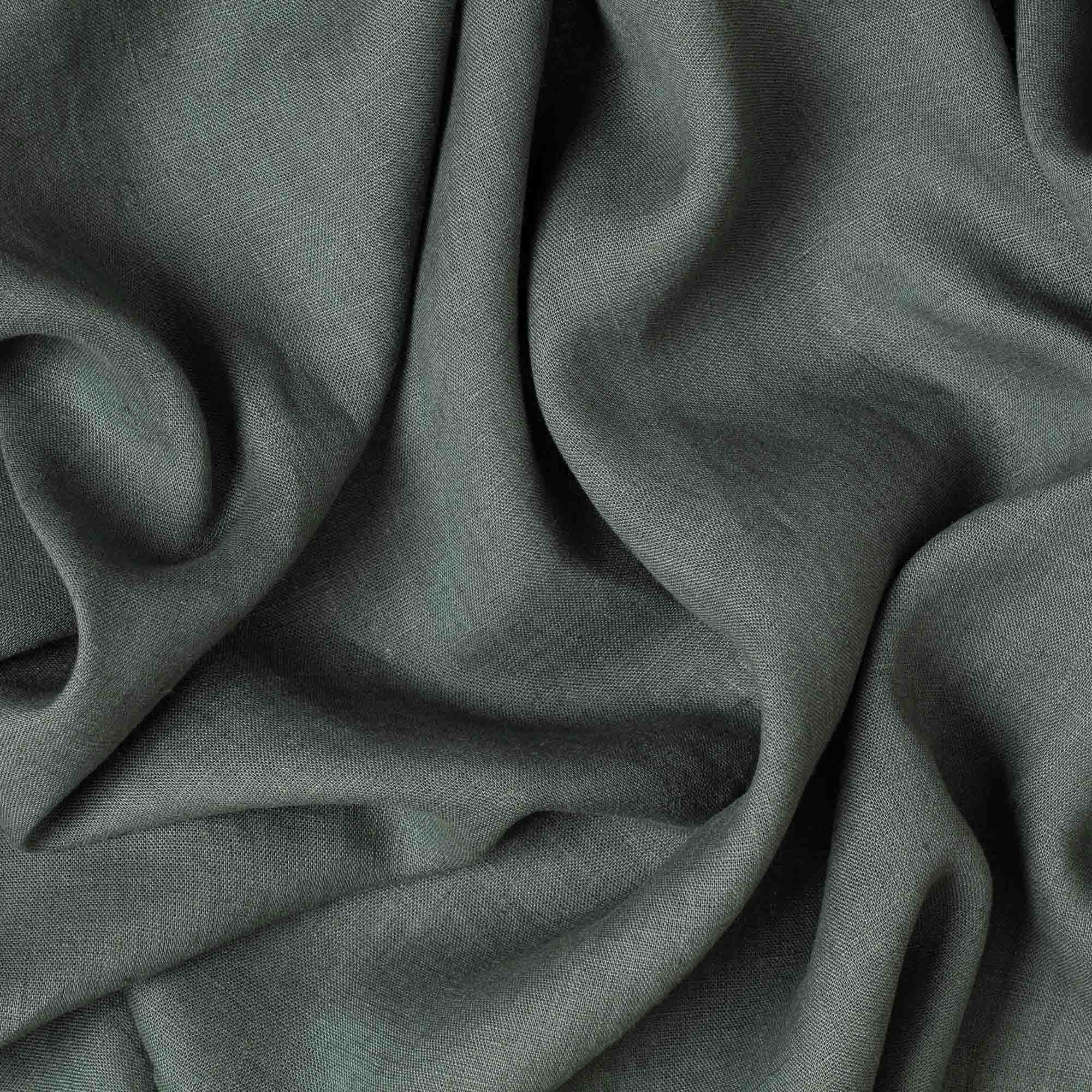 Dark Slate Green linen fabric, crumpled to show its natural texture, washed European flax