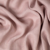 Dusty Lilac linen fabric, crumpled to show its natural texture, washed European flax