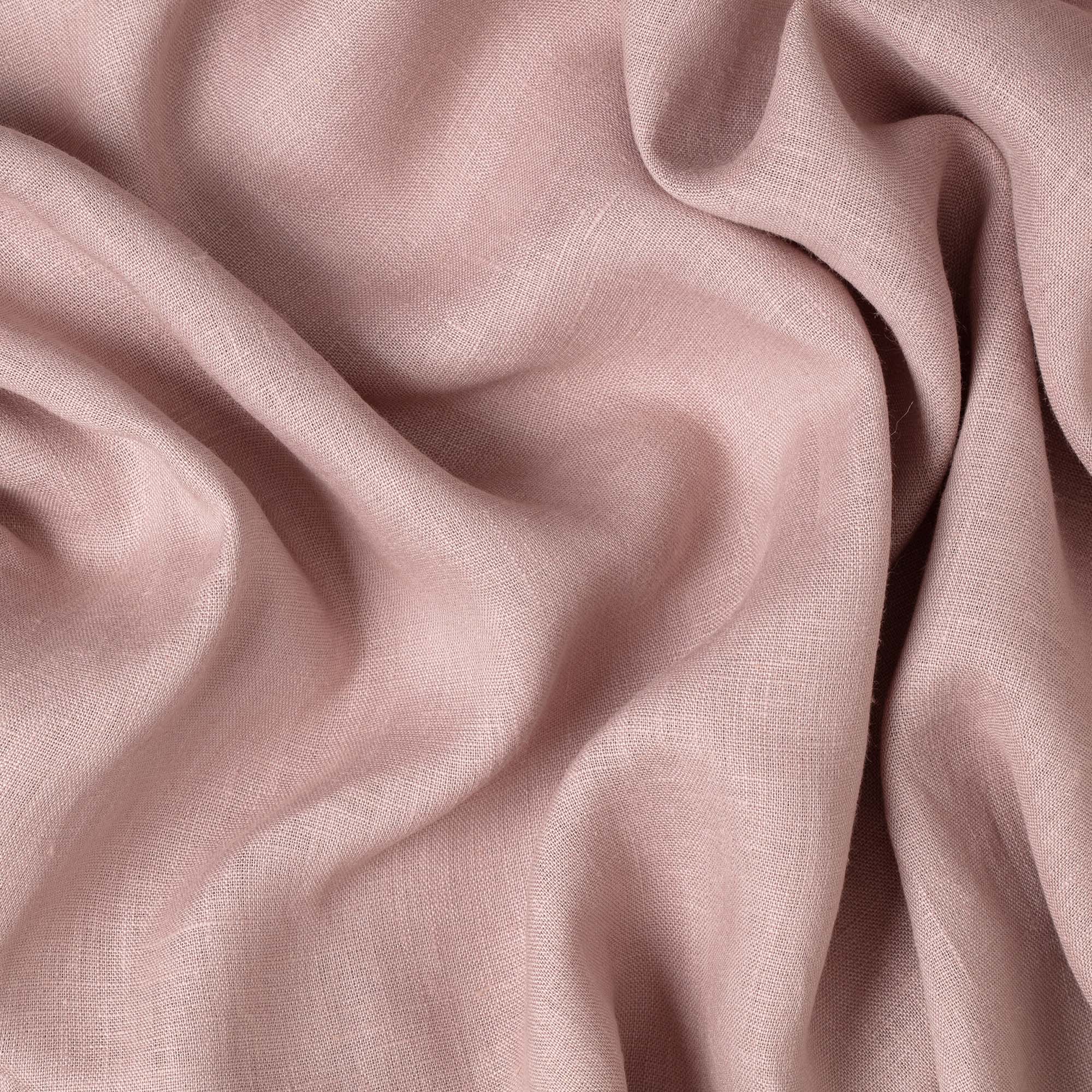 Dusty Lilac linen fabric, crumpled to show its natural texture, washed European flax