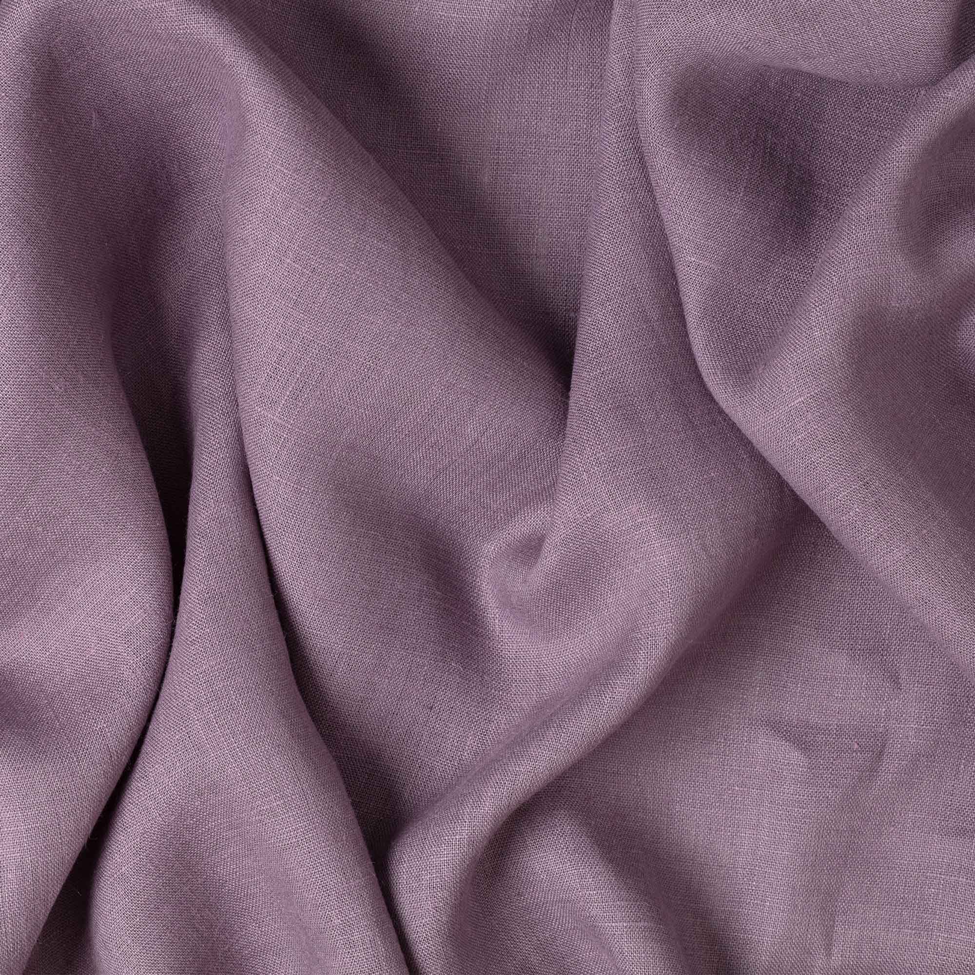 Dusty Purple linen fabric, crumpled to show its natural texture, washed European flax