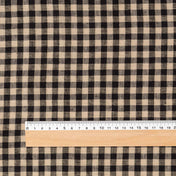 Fine Black & Natural Gingham linen fabric, flat lay with ruler