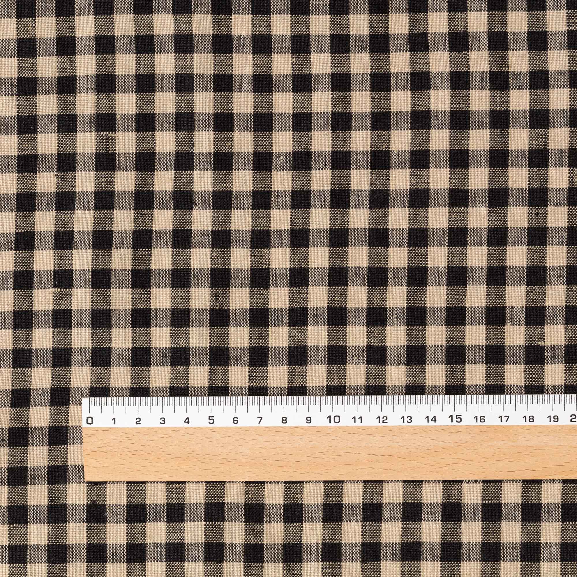 Fine Black & Natural Gingham linen fabric, flat lay with ruler