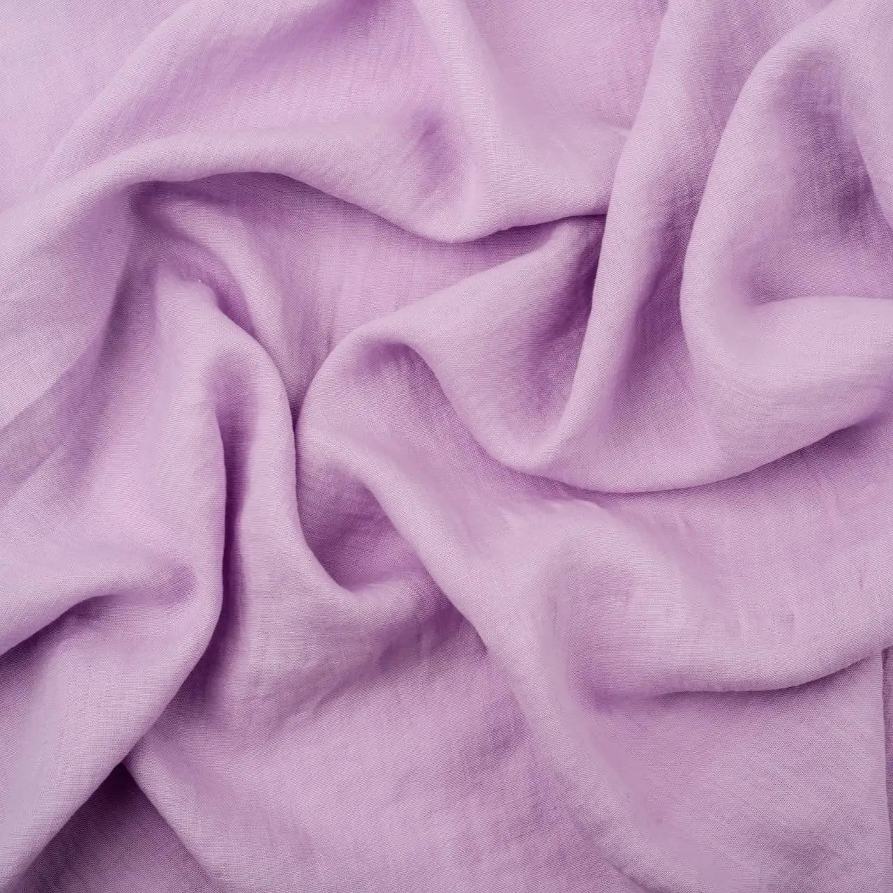 Light Lilac linen fabric, crumpled to show its natural texture, washed European flax