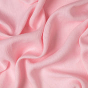 Light Pink linen fabric, crumpled to show its natural texture, washed European flax