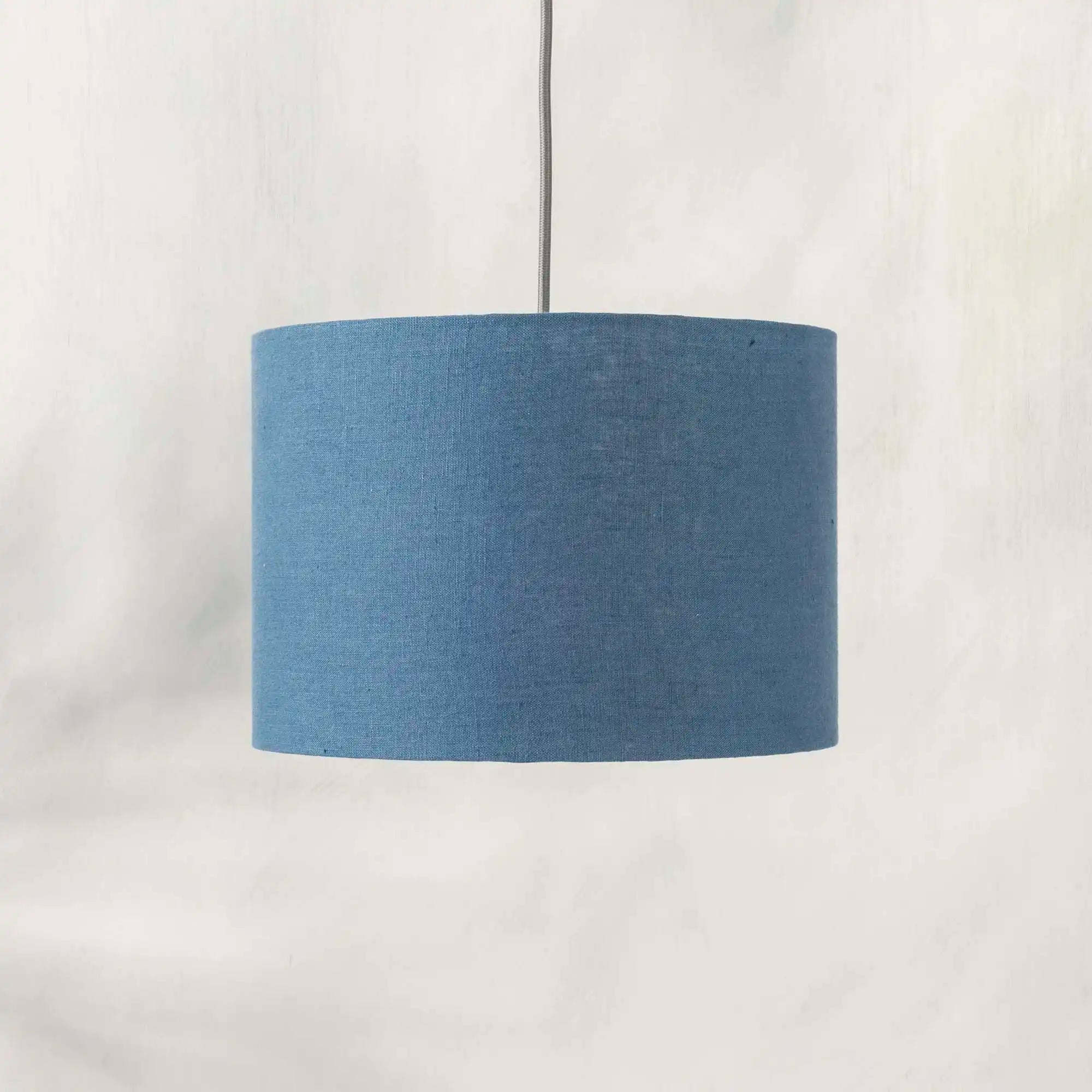 Blue ceiling lampshade made from textured linen 