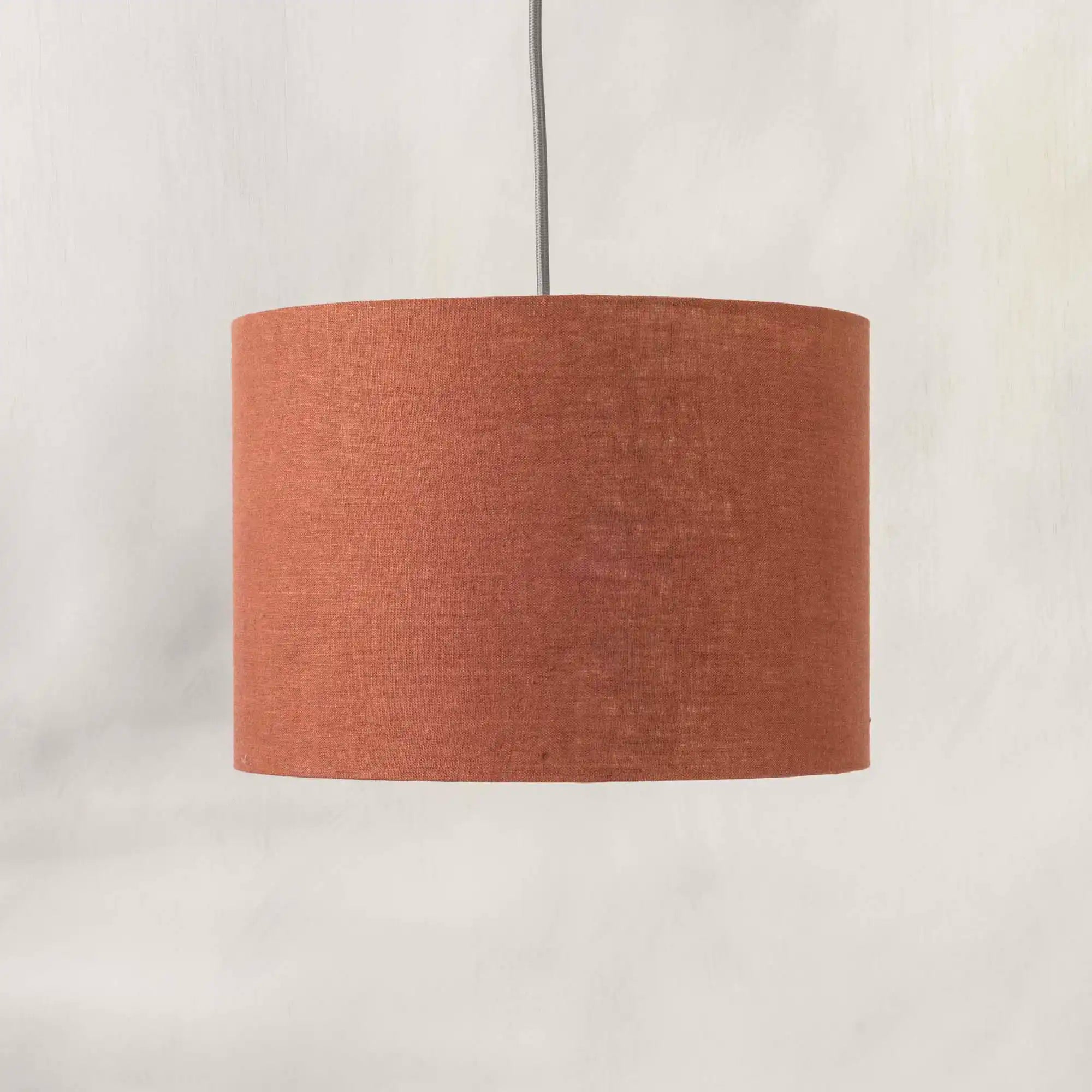 Terracotta ceiling lampshade made from textured linen 