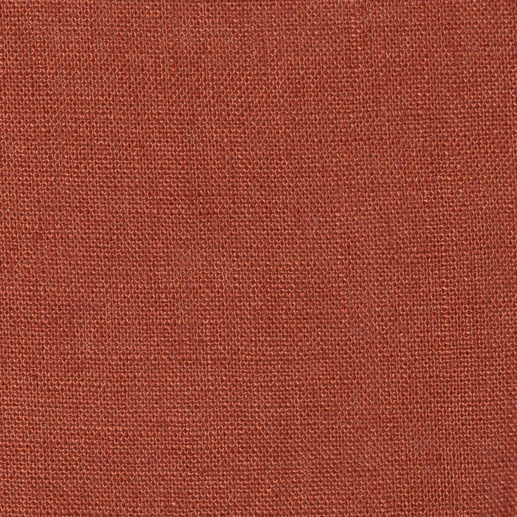Terracotta linen fabric, flat lay showing its natural weave, washed European flax