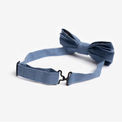 Close up of dusty blue bow tie hook fastener 