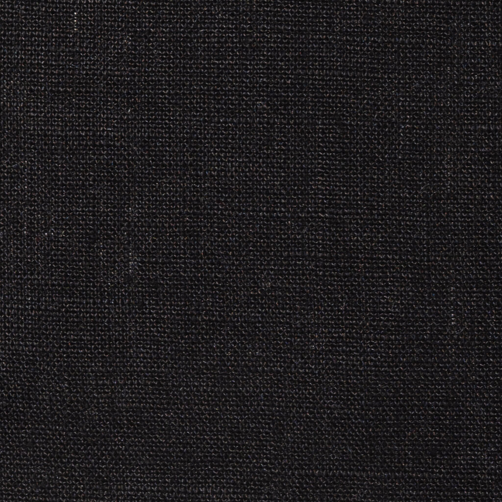 Black linen fabric, flat lay showing its natural weave, washed European flax
