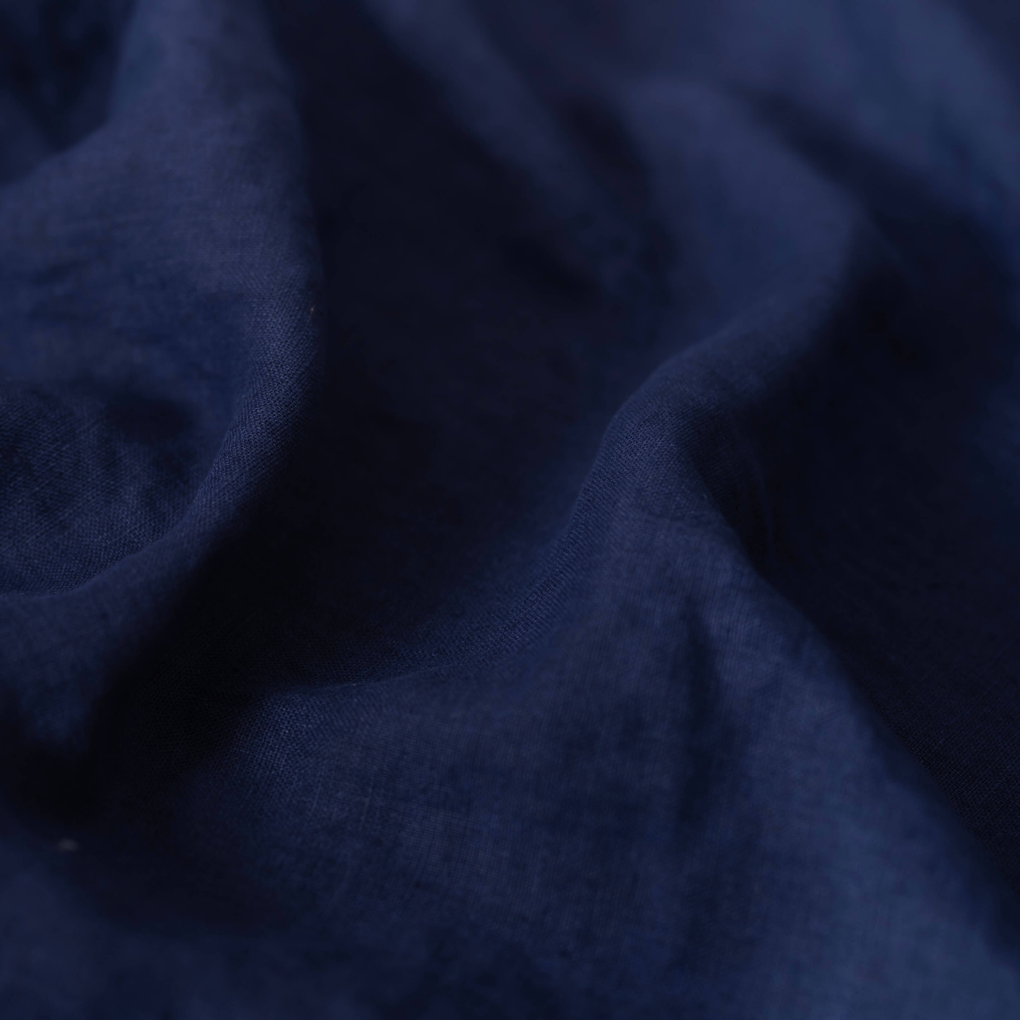 Navy Blue linen fabric, crumpled to show its natural texture, washed European flax